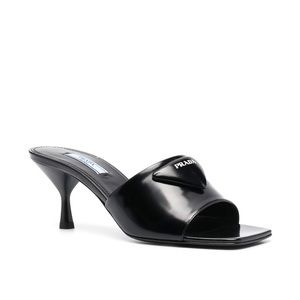 PRADA logo plaque leather mules